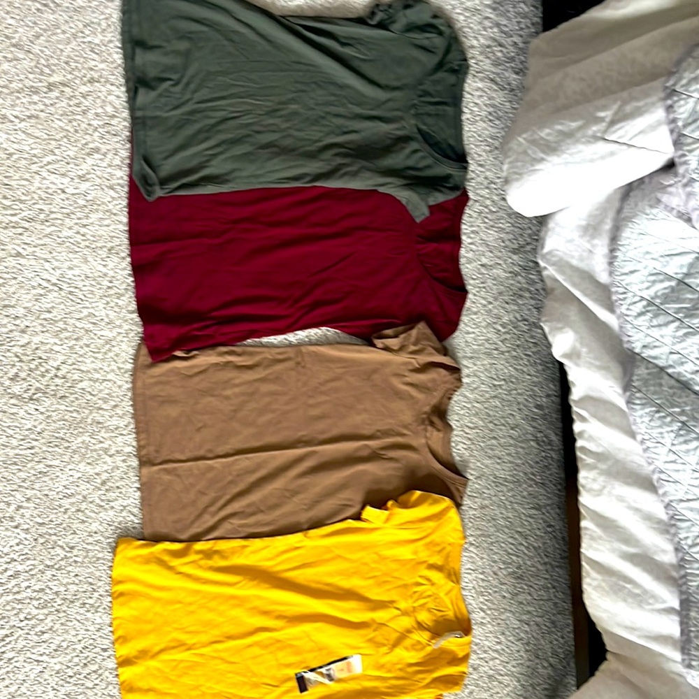 Selling 4 brand new t-shirts